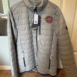 Gray Quilted Jacket with Championship Patch Cutter and Buck